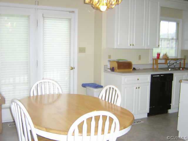 11630 Stephens Point Drive Chester, VA 23831 - Photo 10 of 10 a view of a dining room with furniture and window