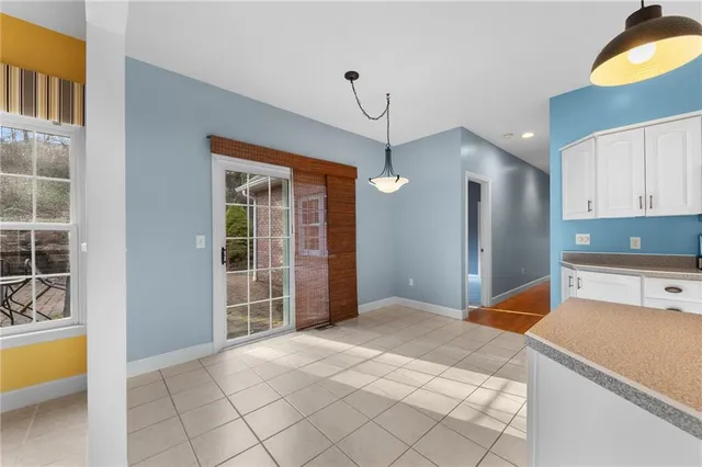 a kitchen with stainless steel appliances a refrigerator and a sink