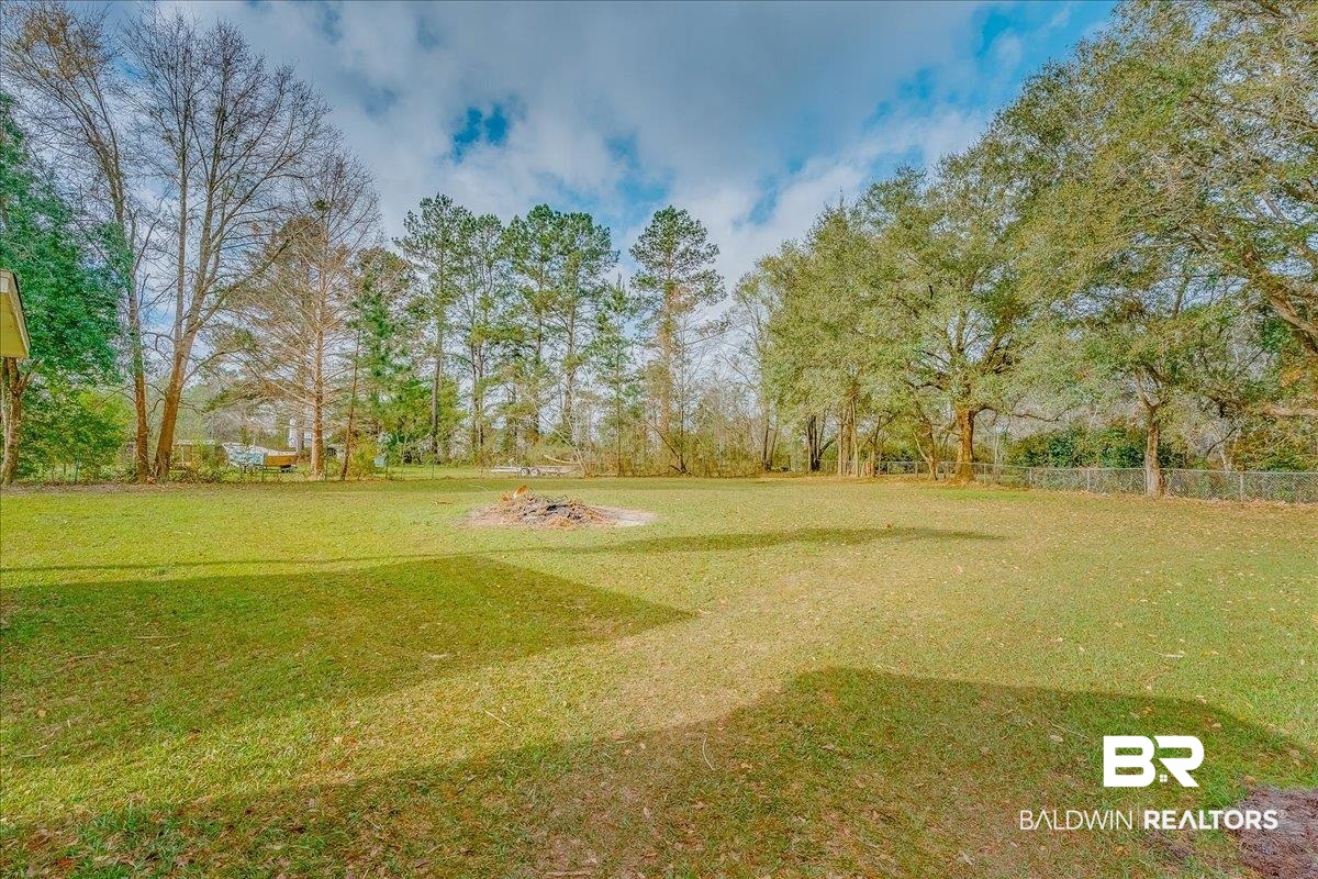 440 Dykes Road Mobile, AL 36608 - Photo 35 of 49 View of yard featuring fence