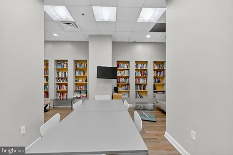 hallway with seating area
