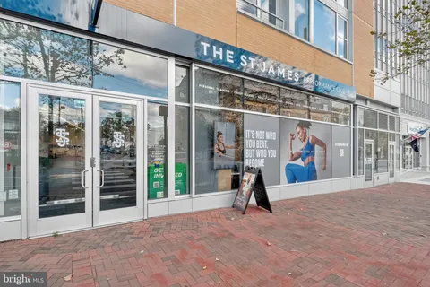 a view of a fireplace with a rug