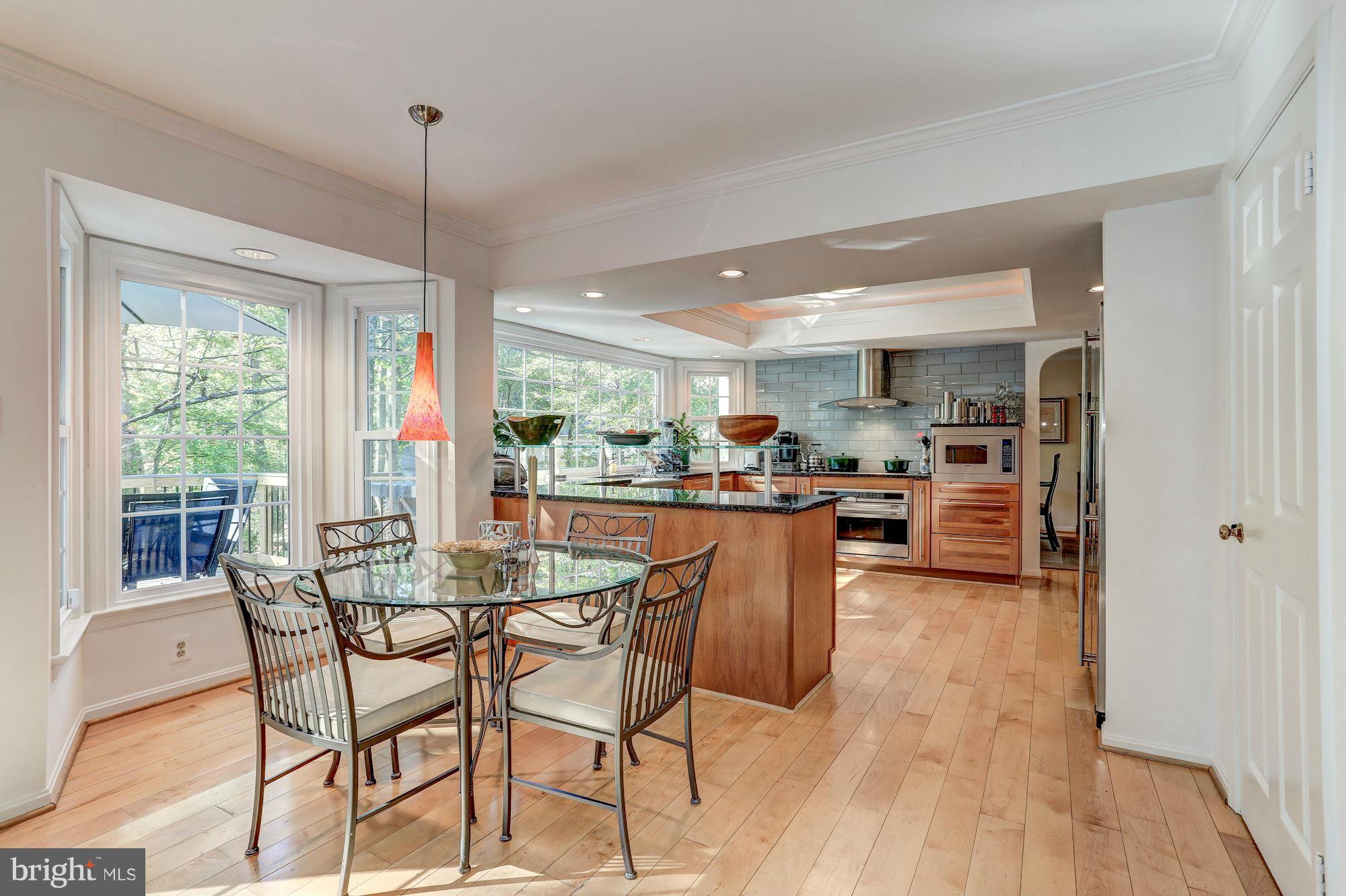2232 Wakerobin Lane Reston, VA 20191 - Photo 12 of 30 a dining room with furniture and window