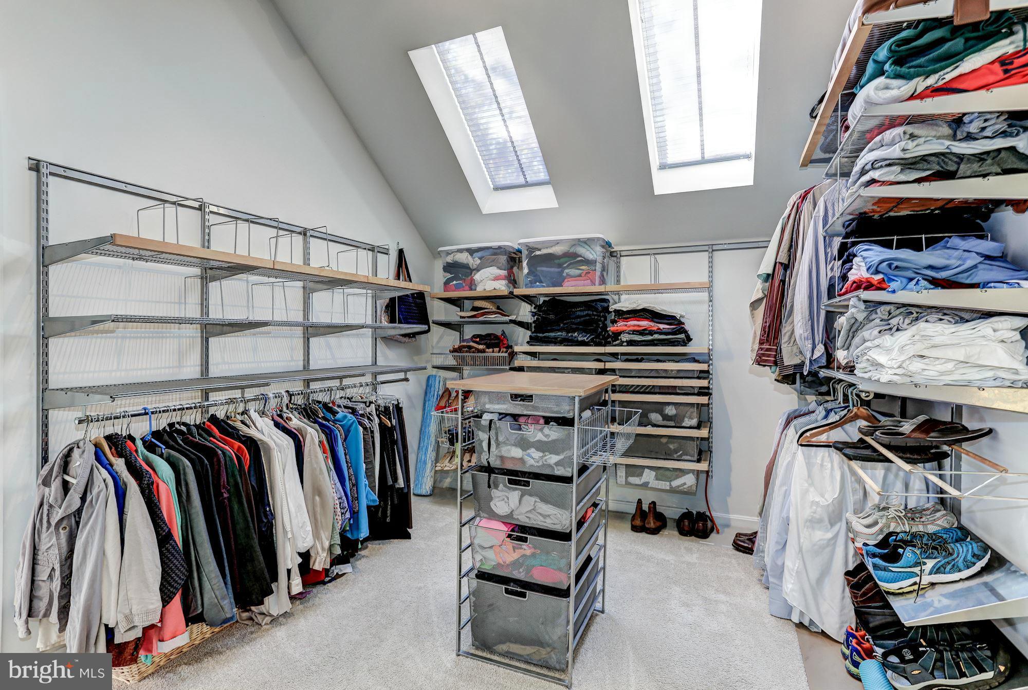 2232 Wakerobin Lane Reston, VA 20191 - Photo 18 of 30 a view of walk in closet with clothes and shoes