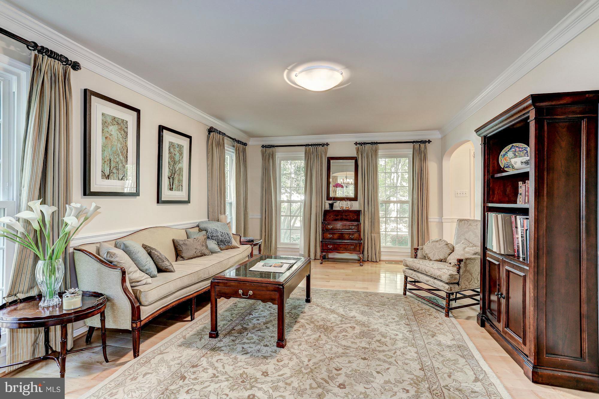 2232 Wakerobin Lane Reston, VA 20191 - Photo 8 of 30 a living room with furniture and a window
