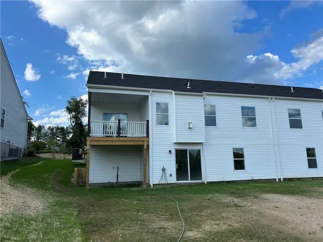 a house view with a garden space