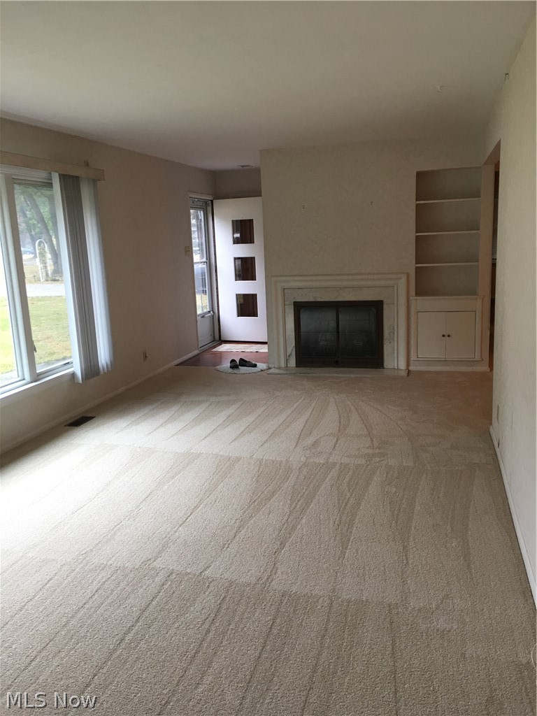 11695 Prospect Road Strongsville, OH 44149 - Photo 2 of 28 Living room with fireplace