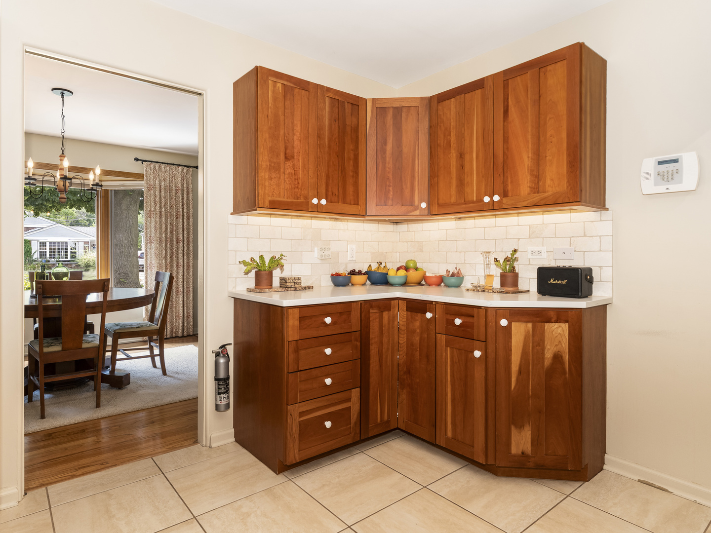 9237 Forestview Road Evanston, IL 60203 - Photo 11 of 33 a kitchen with stainless steel appliances granite countertop a refrigerator and cabinets