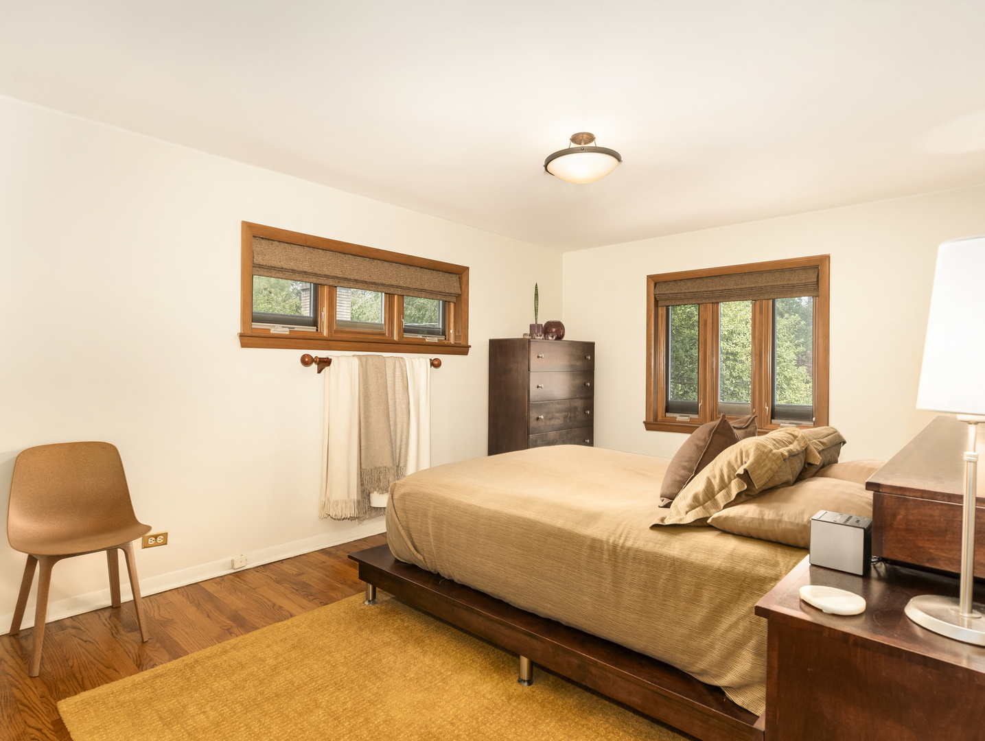 9237 Forestview Road Evanston, IL 60203 - Photo 12 of 33 a bedroom with a bed and a window