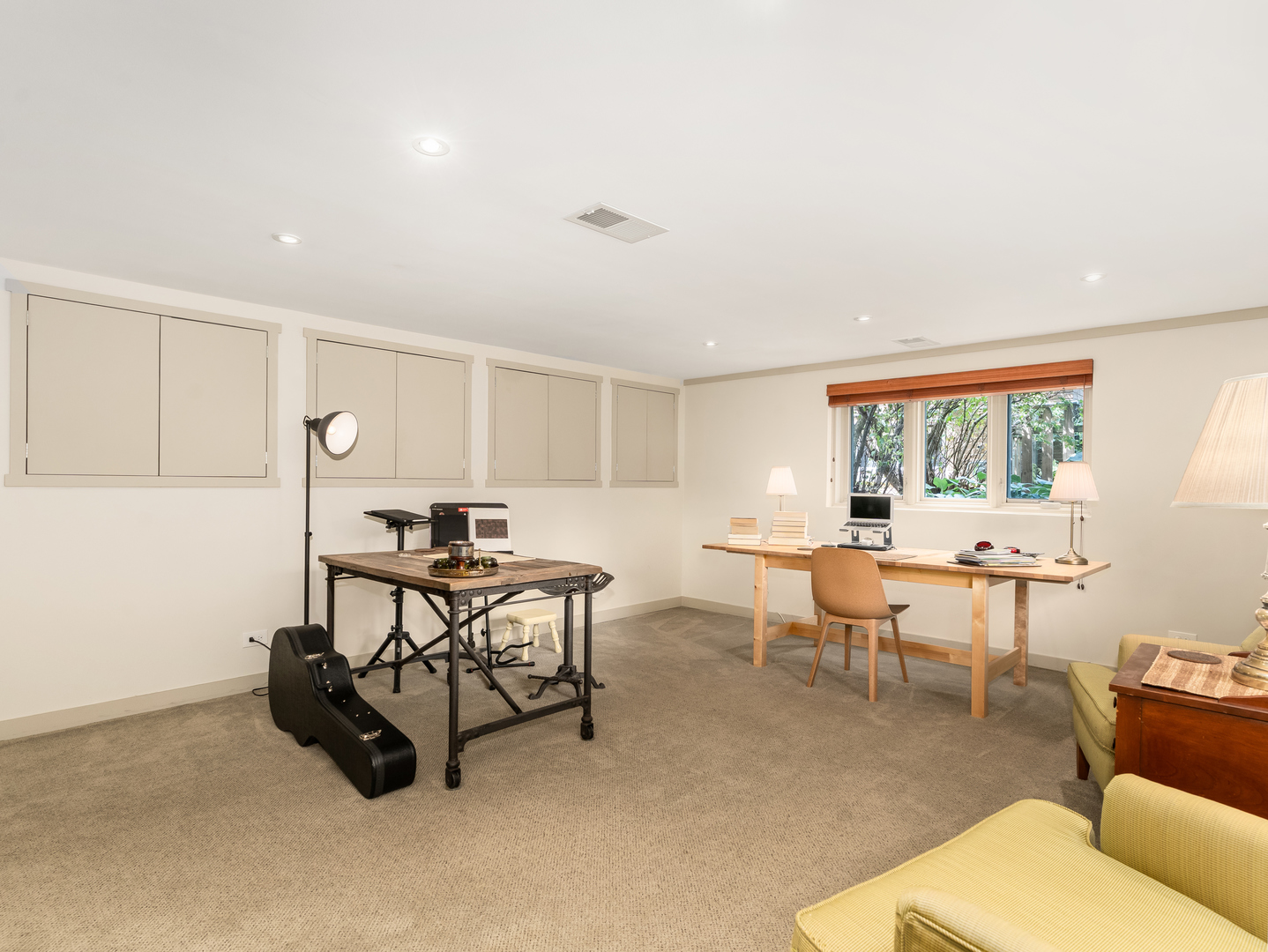 9237 Forestview Road Evanston, IL 60203 - Photo 17 of 33 a living room with furniture a window and a table