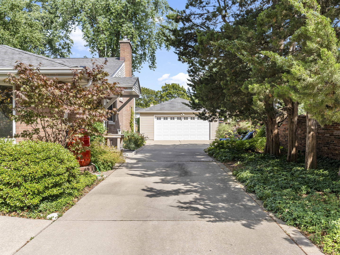 9237 Forestview Road Evanston, IL 60203 - Photo 20 of 33 a front view of a house with a yard and a garage
