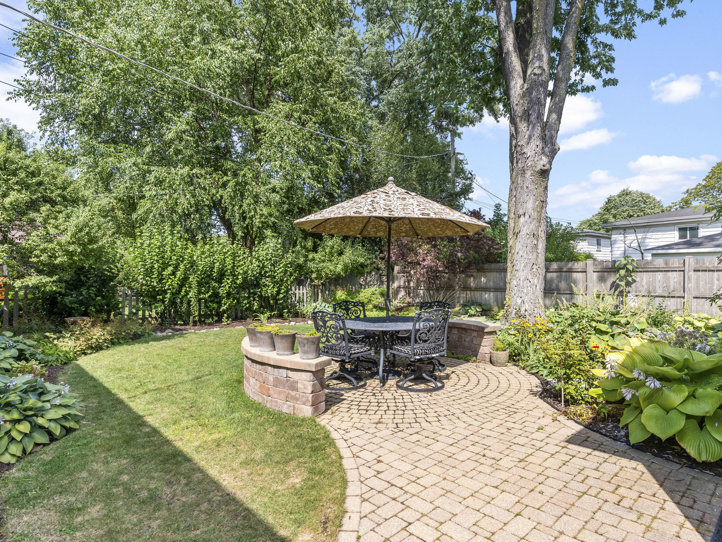 9237 Forestview Road Evanston, IL 60203 - Photo 22 of 33 a view of a backyard with sitting area