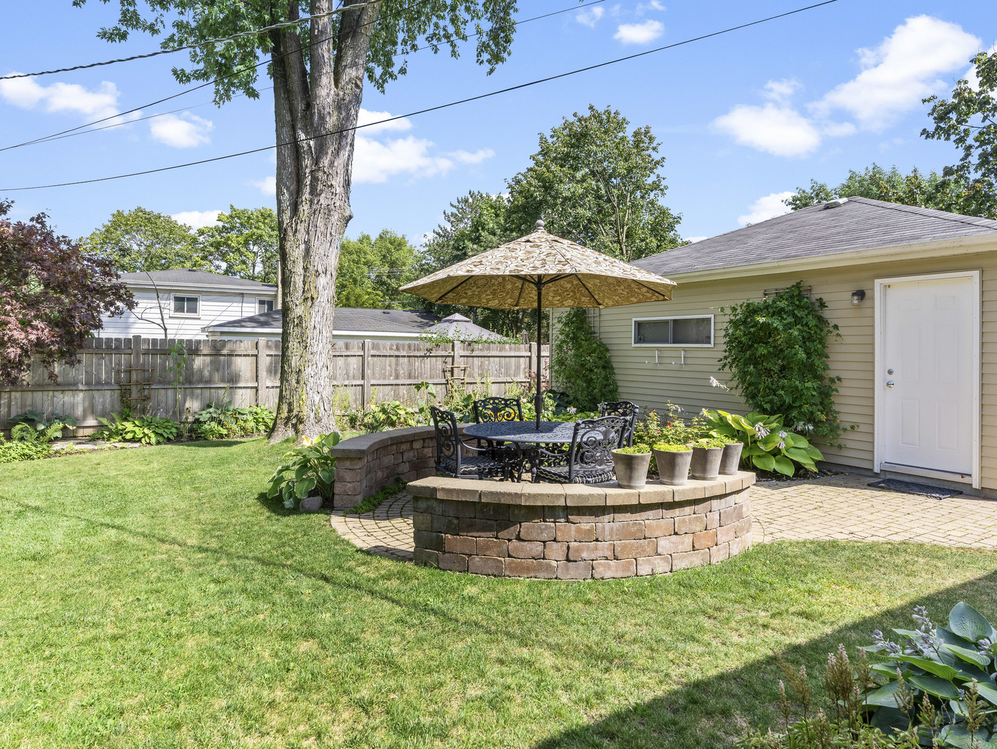 9237 Forestview Road Evanston, IL 60203 - Photo 24 of 33 a front view of house with yard and outdoor seating