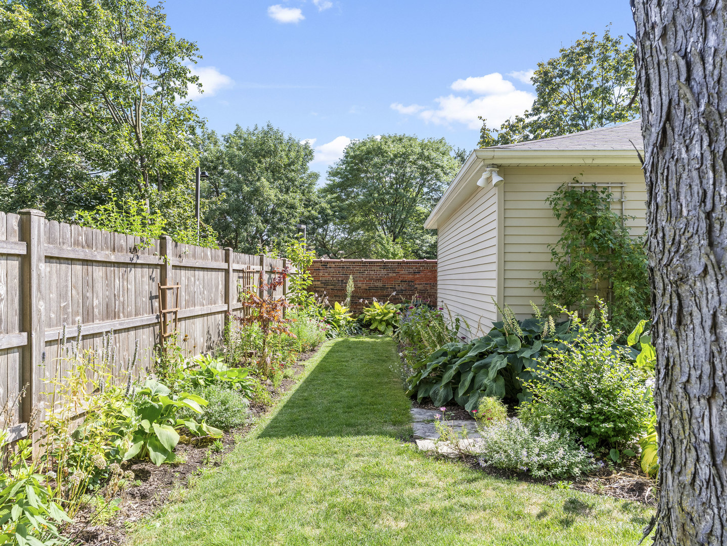 9237 Forestview Road Evanston, IL 60203 - Photo 25 of 33 a view of a backyard with a garden