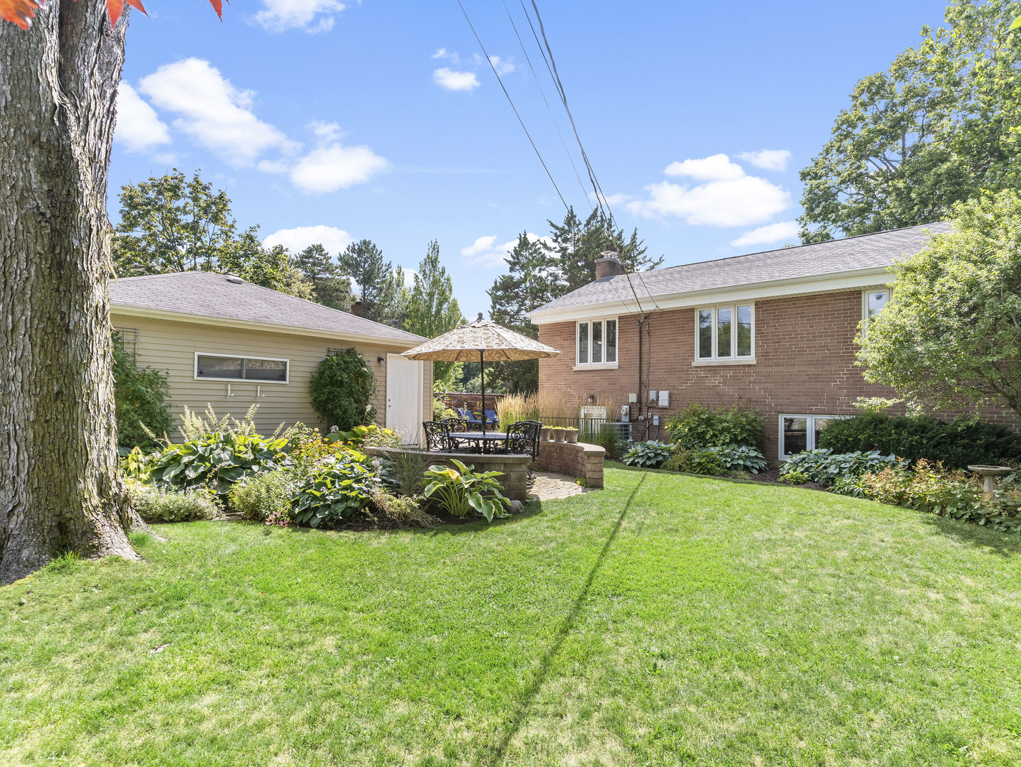 9237 Forestview Road Evanston, IL 60203 - Photo 26 of 33 front view of a house with a yard
