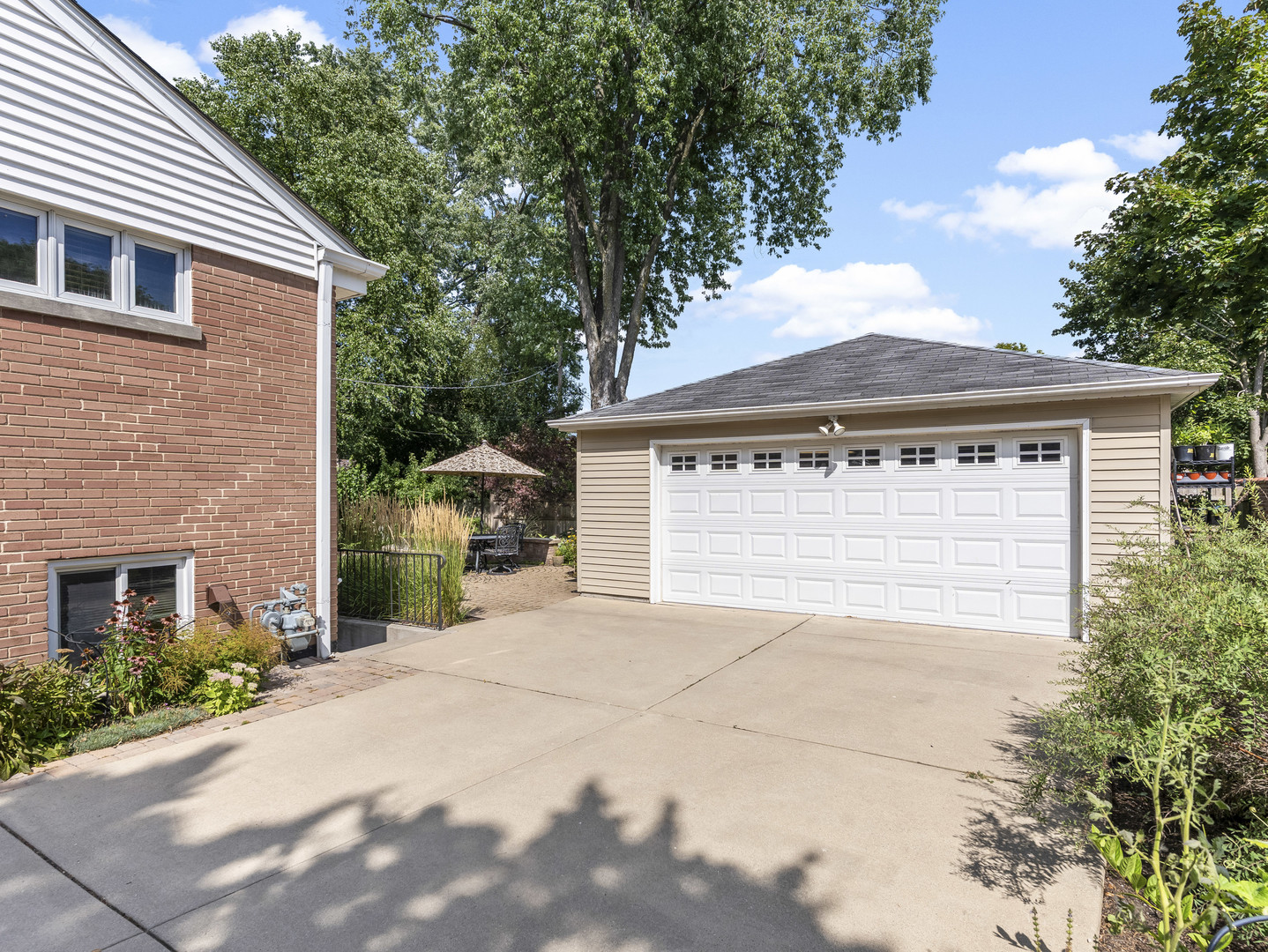 9237 Forestview Road Evanston, IL 60203 - Photo 27 of 33 a front view of a house with a yard and garage