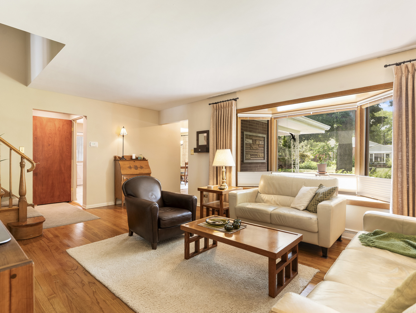 9237 Forestview Road Evanston, IL 60203 - Photo 3 of 33 a living room with furniture and a large window