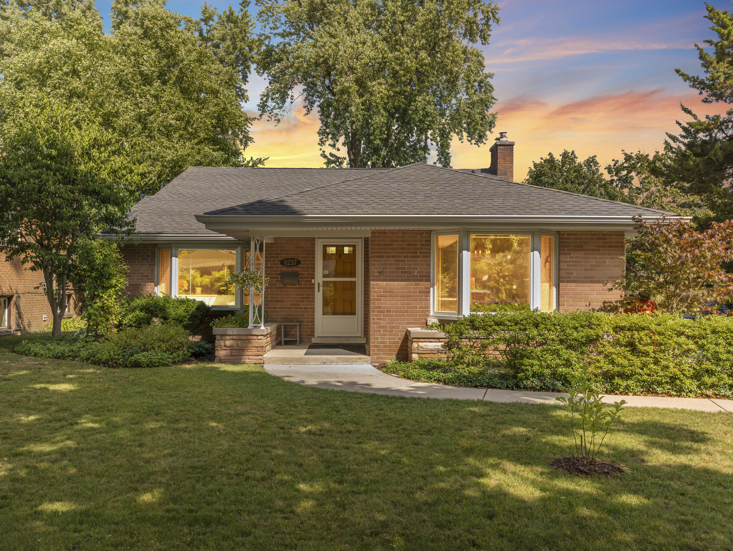 9237 Forestview Road Evanston, IL 60203 - Photo 33 of 33 a house view with a seating space and garden