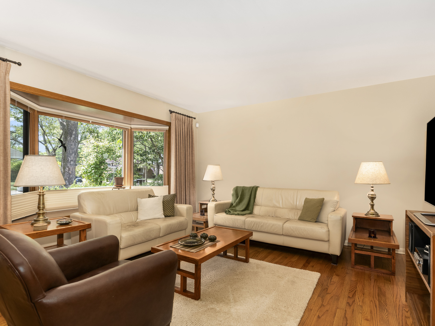 9237 Forestview Road Evanston, IL 60203 - Photo 4 of 33 a living room with furniture and a large window