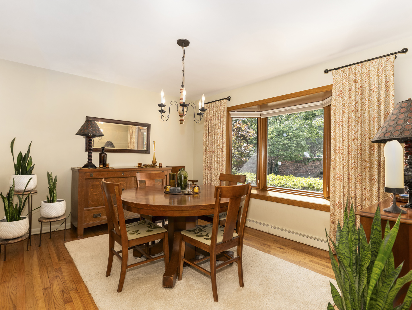 9237 Forestview Road Evanston, IL 60203 - Photo 6 of 33 a view of a dining room with furniture window and outside view