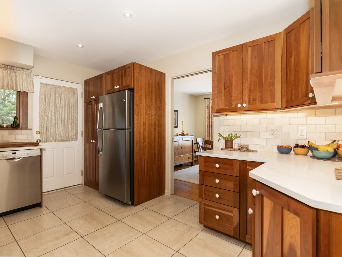 9237 Forestview Road Evanston, IL 60203 - Photo 10 of 33 a kitchen with stainless steel appliances granite countertop a refrigerator and a sink