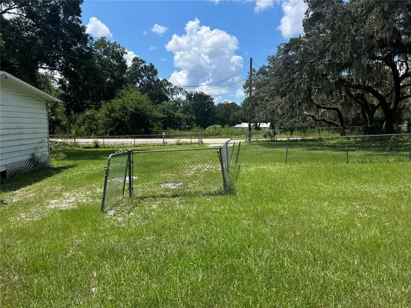a view of a golf course with a lake