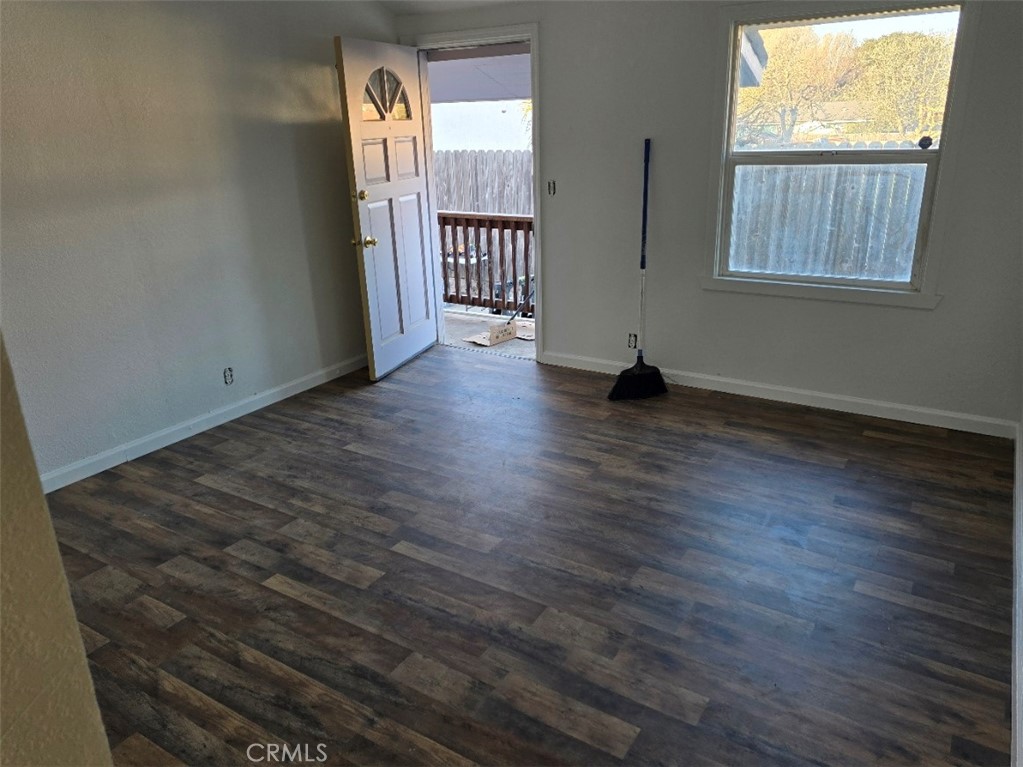 3470 Point Sal Road Casmalia, CA 93429 - Photo 14 of 17 an empty room with wooden floor and windows