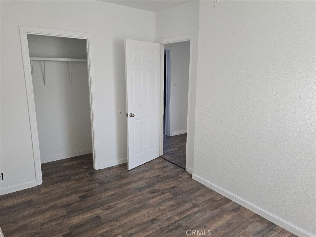 3470 Point Sal Road Casmalia, CA 93429 - Photo 4 of 17 a view of an empty room with wooden floor & closet