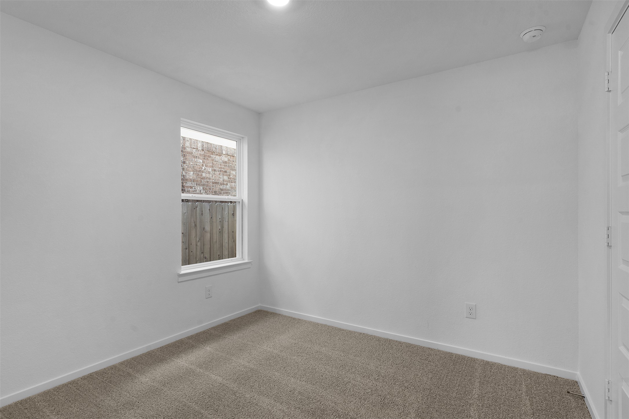 25608 Wheat Seed Lane Elgin, TX 78621 - Photo 13 of 17 Empty room with baseboards and carpet