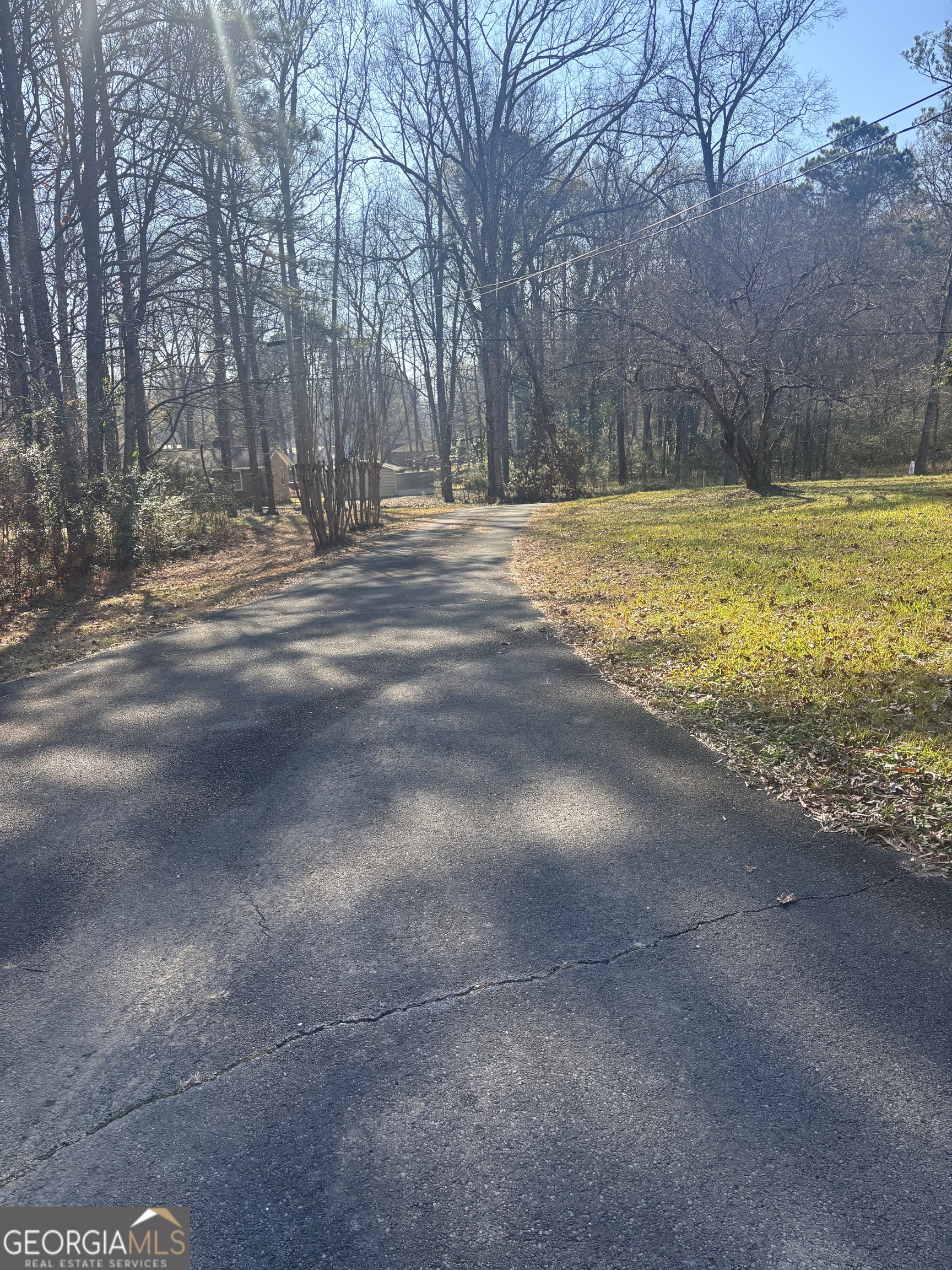 137 New Hermitage Road Northeast Rome, GA 30161 - Photo 16 of 17 a view of a swimming pool with a yard