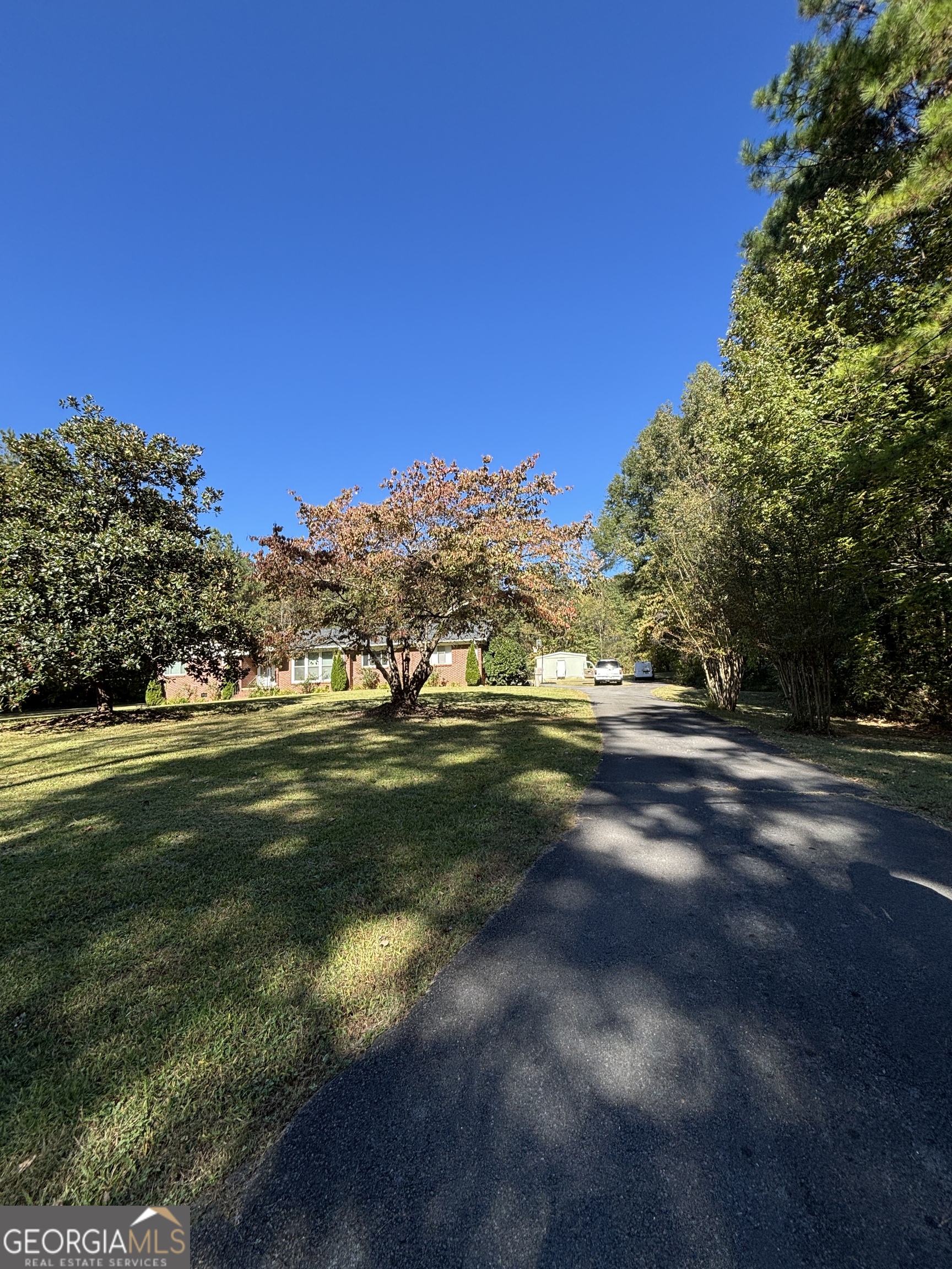 137 New Hermitage Road Northeast Rome, GA 30161 - Photo 2 of 17 a view of a field with trees in the background