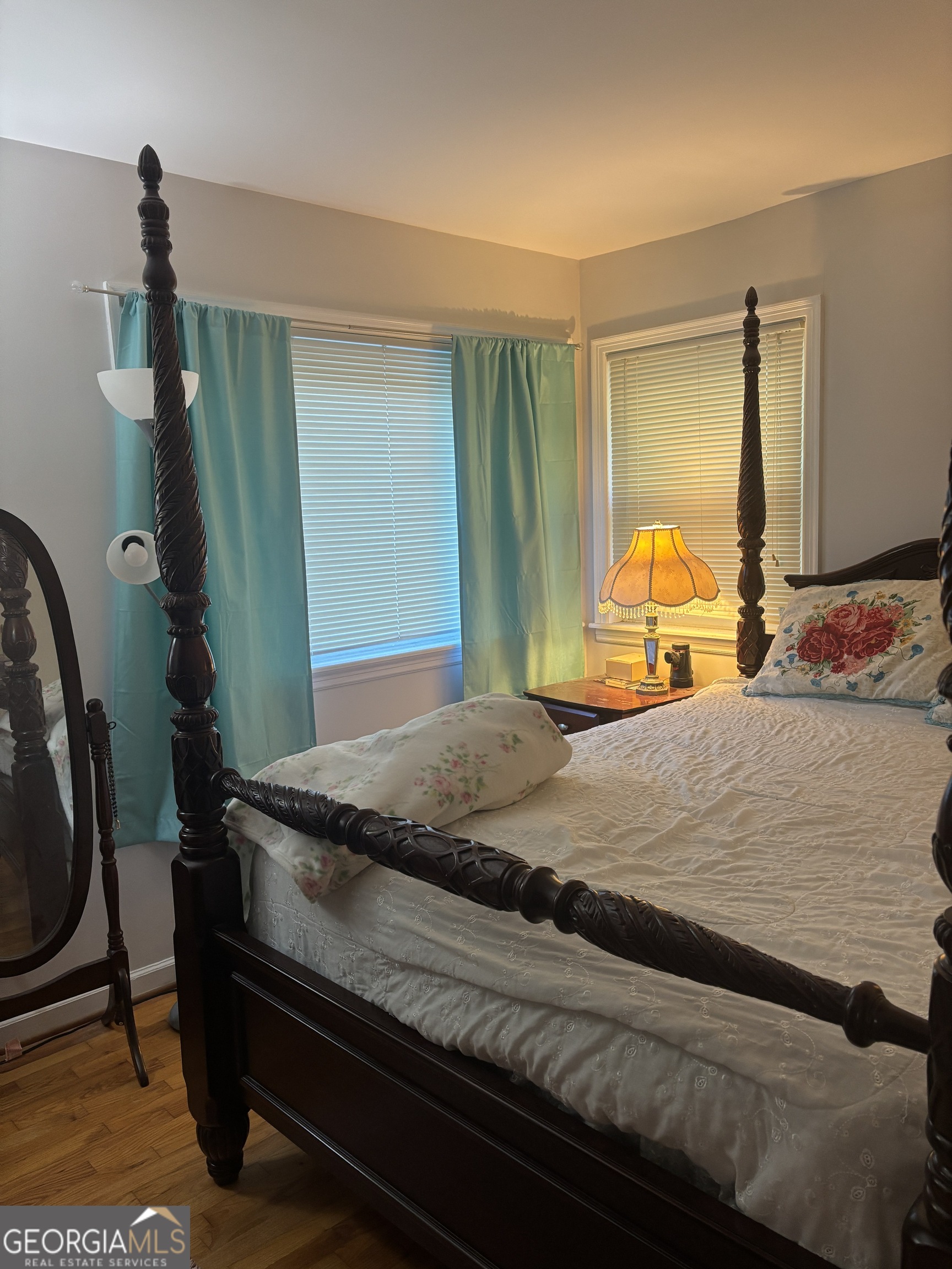 137 New Hermitage Road Northeast Rome, GA 30161 - Photo 3 of 17 a bedroom with a bed and a dresser