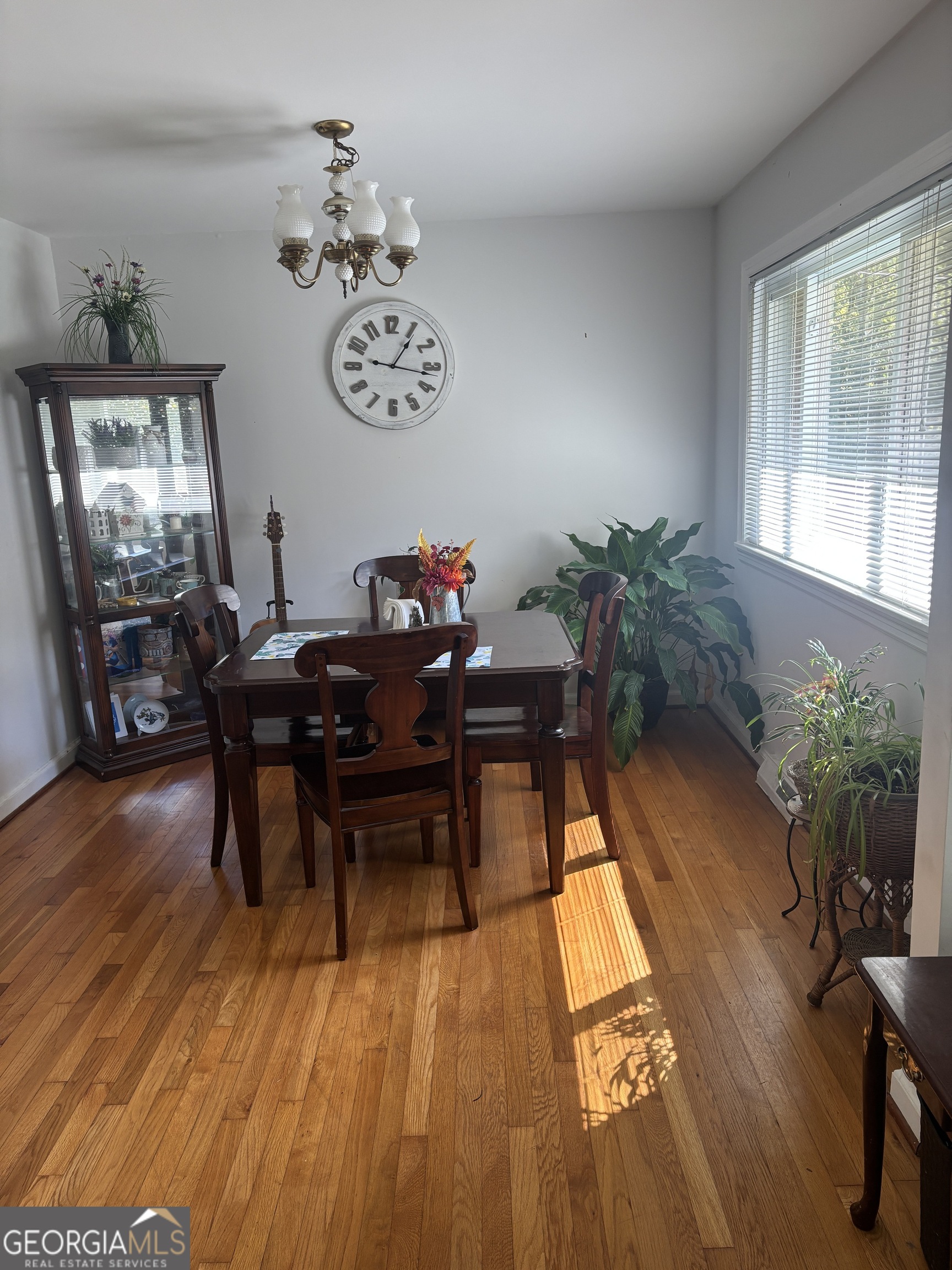 137 New Hermitage Road Northeast Rome, GA 30161 - Photo 10 of 17 a view of a dining room with furniture window and wooden floor