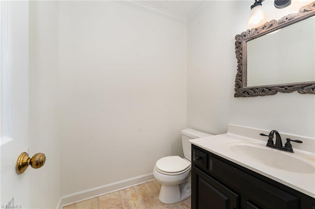 4107 Rockingham Road South Greensboro, NC 27407 - Photo 24 of 50 Downstairs half bathroom