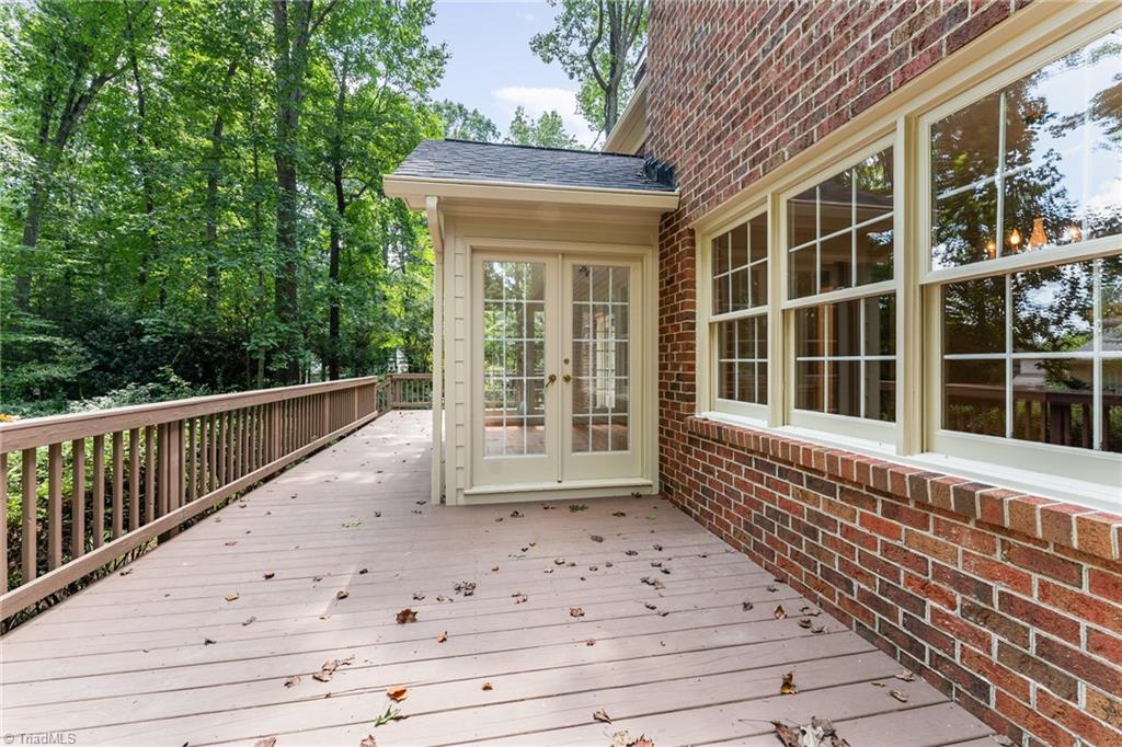 4107 Rockingham Road South Greensboro, NC 27407 - Photo 45 of 50 Back deck to enjoy the private backyard