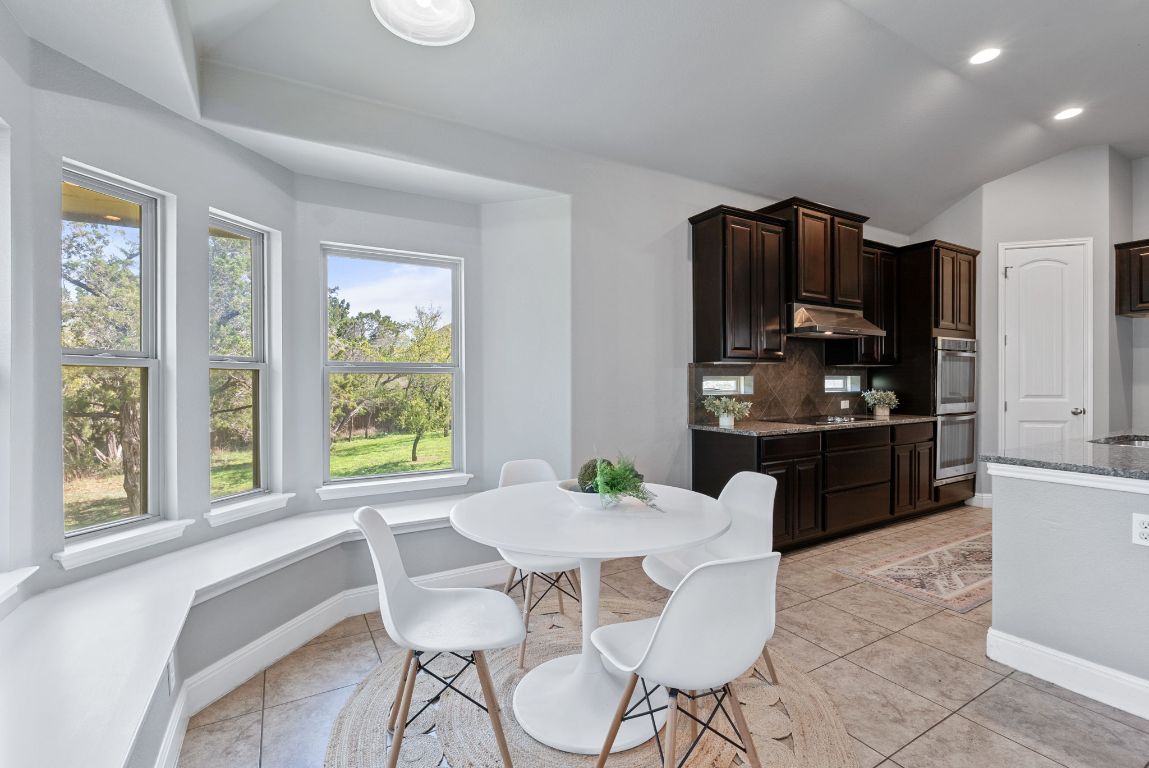 7817 Aria Loop Austin, TX 78736 - Photo 18 of 40 Enjoy morning coffee as you look out over the backyard.