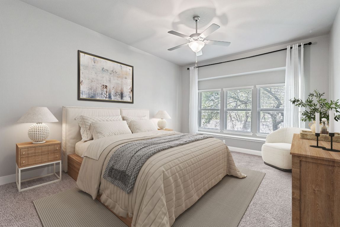 7817 Aria Loop Austin, TX 78736 - Photo 20 of 40 The primary bedroom is located on the main level and overlooks the backyard.
