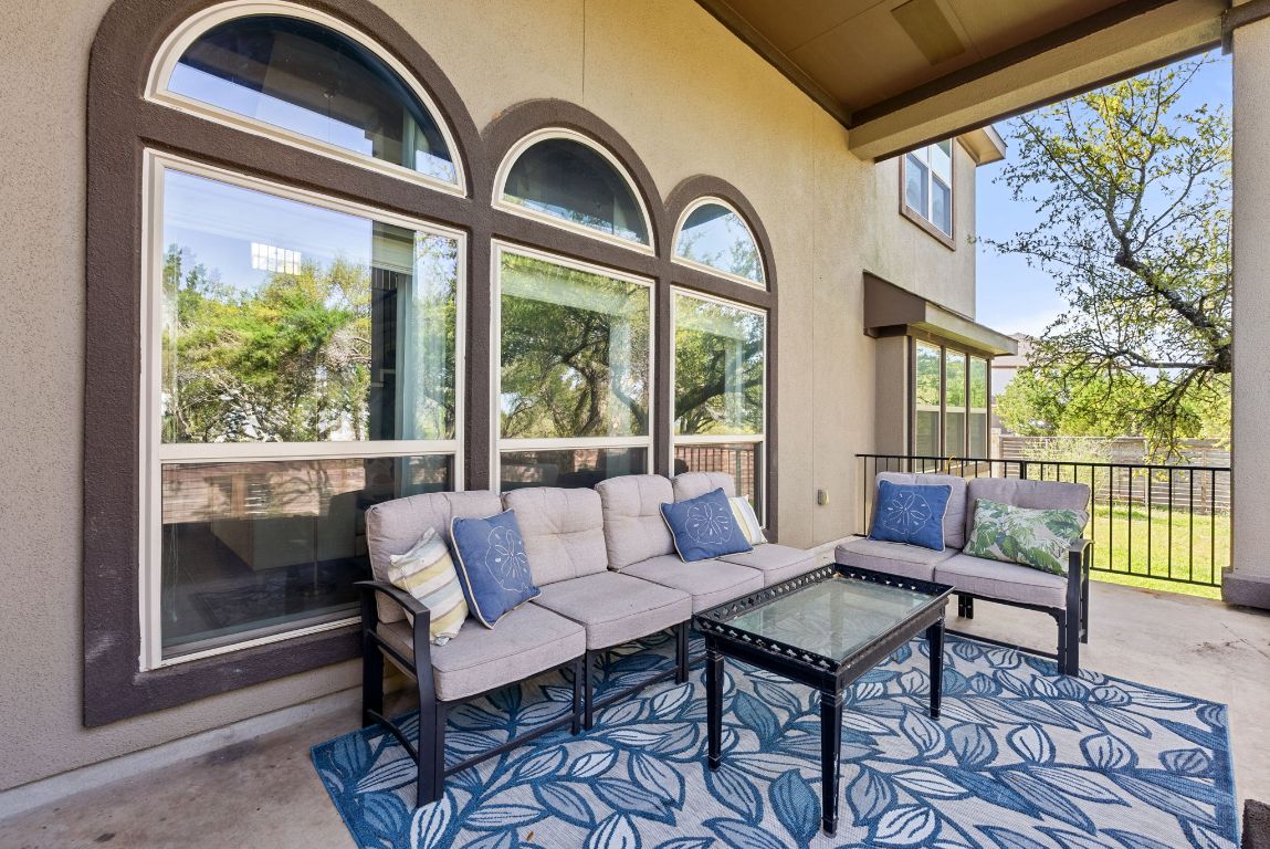 7817 Aria Loop Austin, TX 78736 - Photo 32 of 40 Covered back deck for outdoor living and dining.