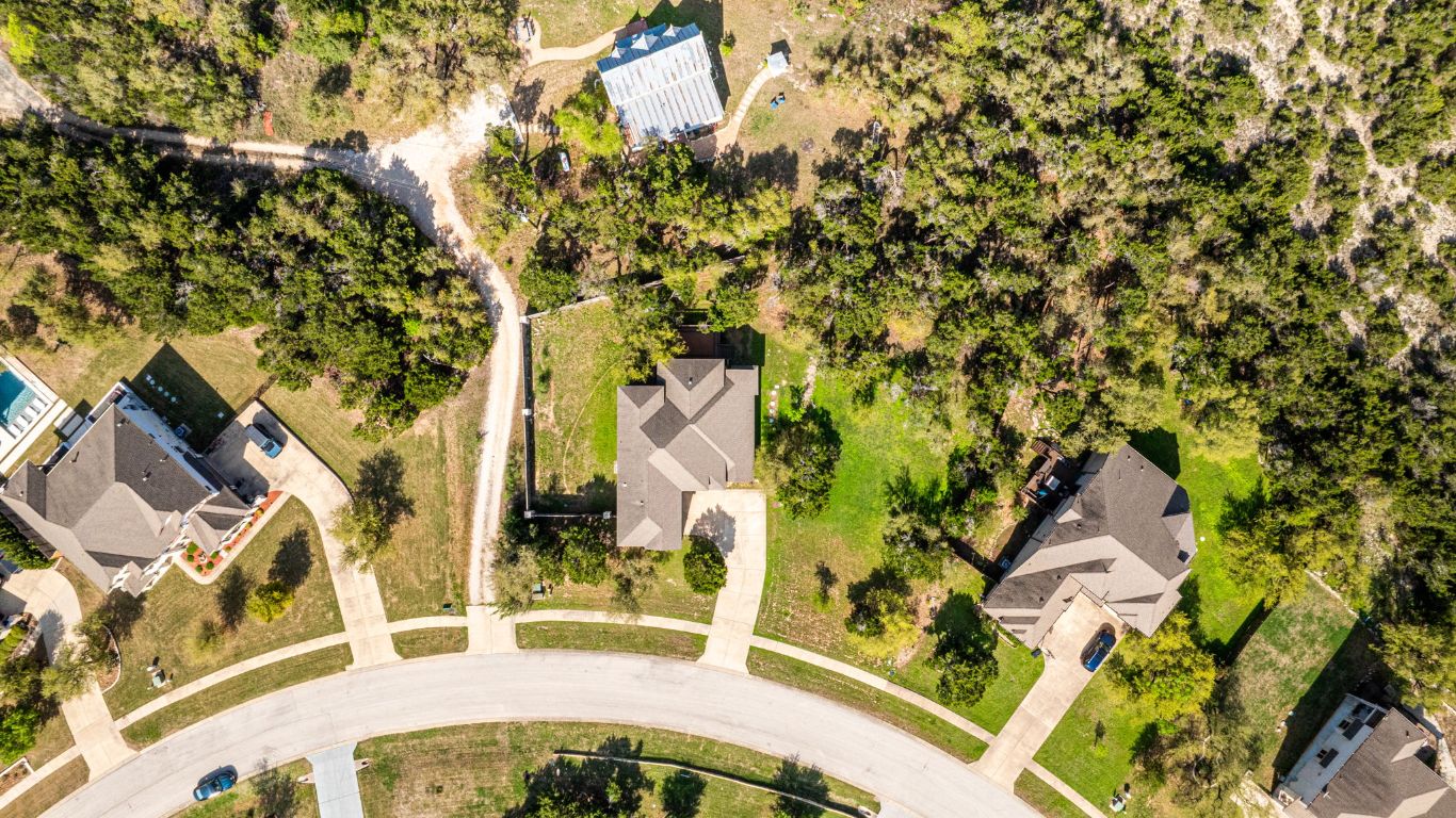 7817 Aria Loop Austin, TX 78736 - Photo 40 of 40 Drone / aerial view, The privacy of an acre lot without all of the upkeep!