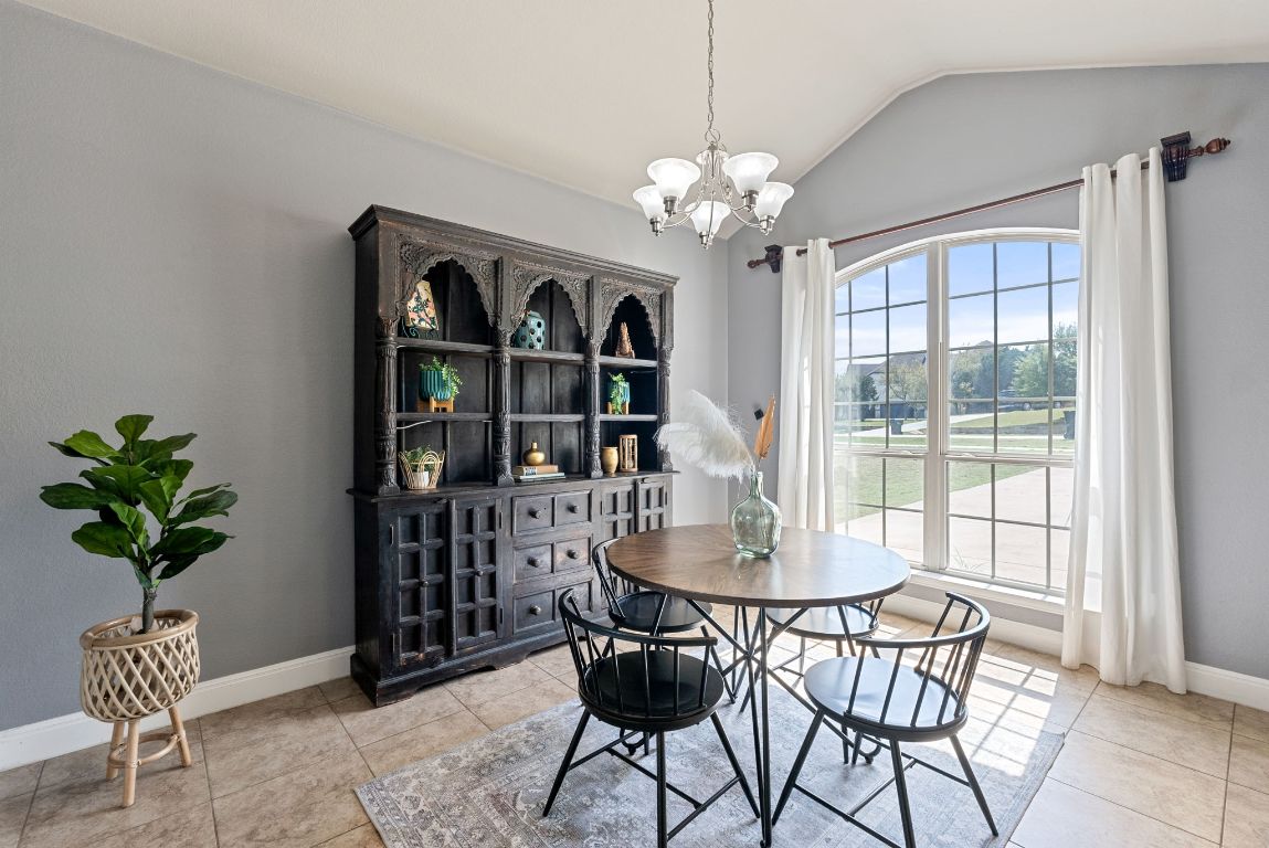 7817 Aria Loop Austin, TX 78736 - Photo 4 of 40 Formal dining with great natural light. One of two dining spaces in the home.