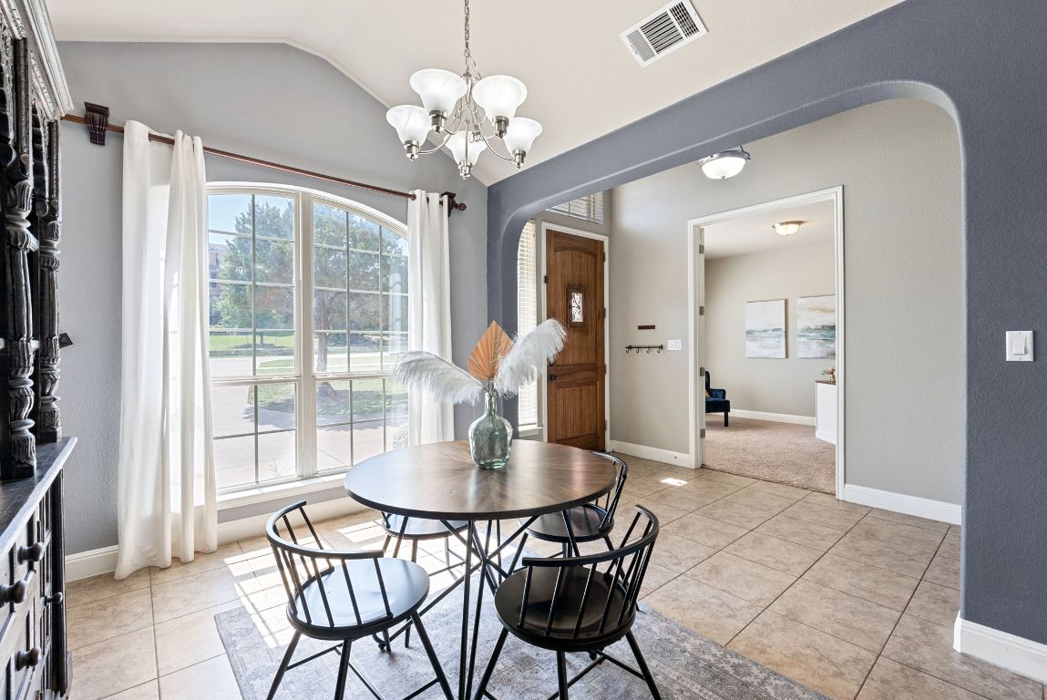 7817 Aria Loop Austin, TX 78736 - Photo 5 of 40 Formal dining with great natural light.