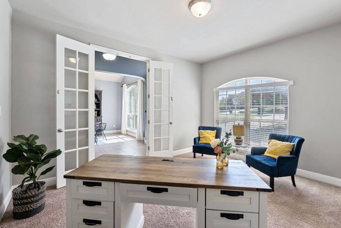 7817 Aria Loop Austin, TX 78736 - Photo 7 of 40 French doors open to the dedicated study/office.