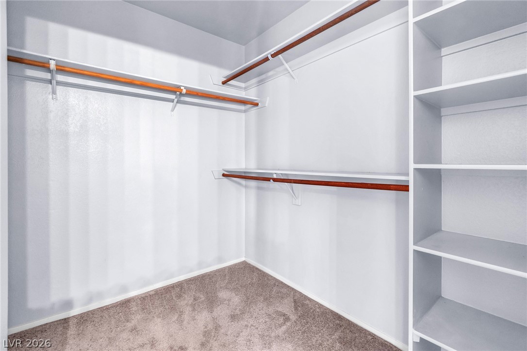 6250 West Flamingo Road, Unit 98 Las Vegas, NV 89103 - Photo 18 of 40 Spacious closet featuring carpet flooring