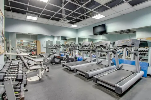 a view of a room with gym equipment