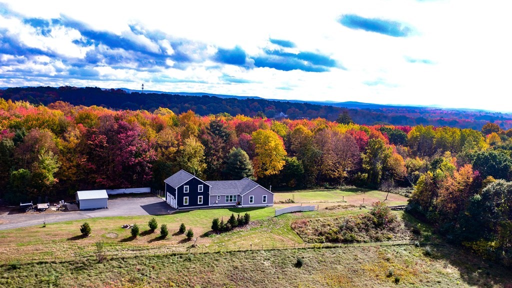 a view of swimming pool with a yard