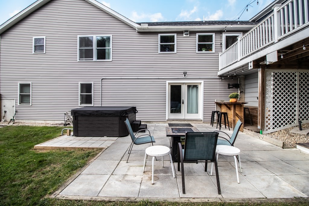 96 Cold Hill Granby, MA 01033 - Photo 13 of 42 a patio with table and chairs