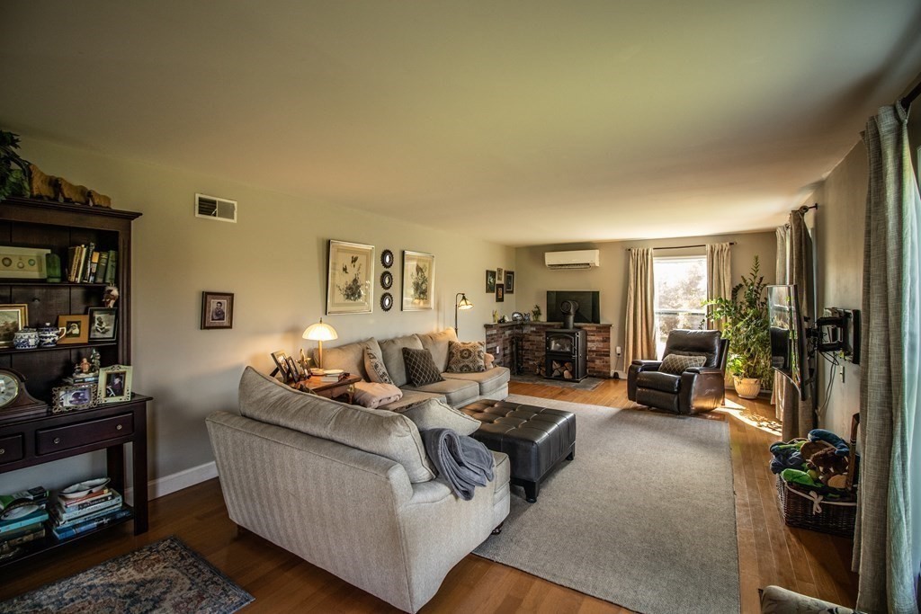 96 Cold Hill Granby, MA 01033 - Photo 27 of 42 a living room with furniture and a flat screen tv