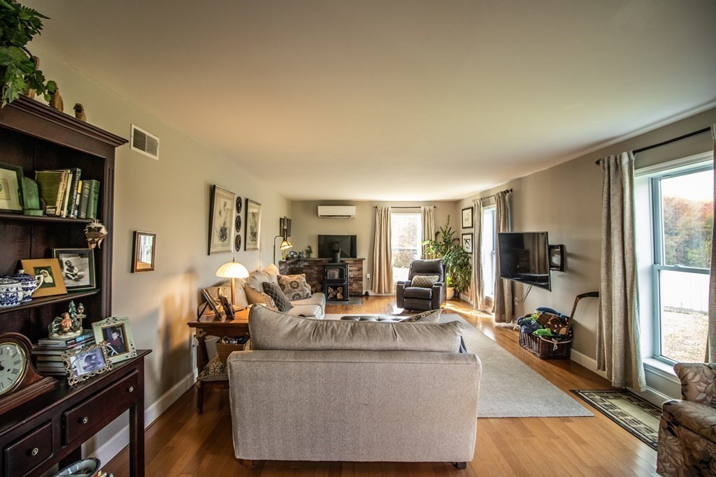 96 Cold Hill Granby, MA 01033 - Photo 28 of 42 a living room with furniture and a flat screen tv