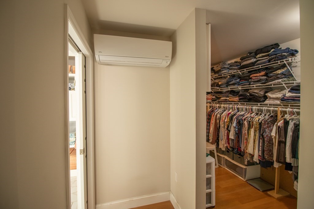 96 Cold Hill Granby, MA 01033 - Photo 33 of 42 a view of walk in closet with clothes