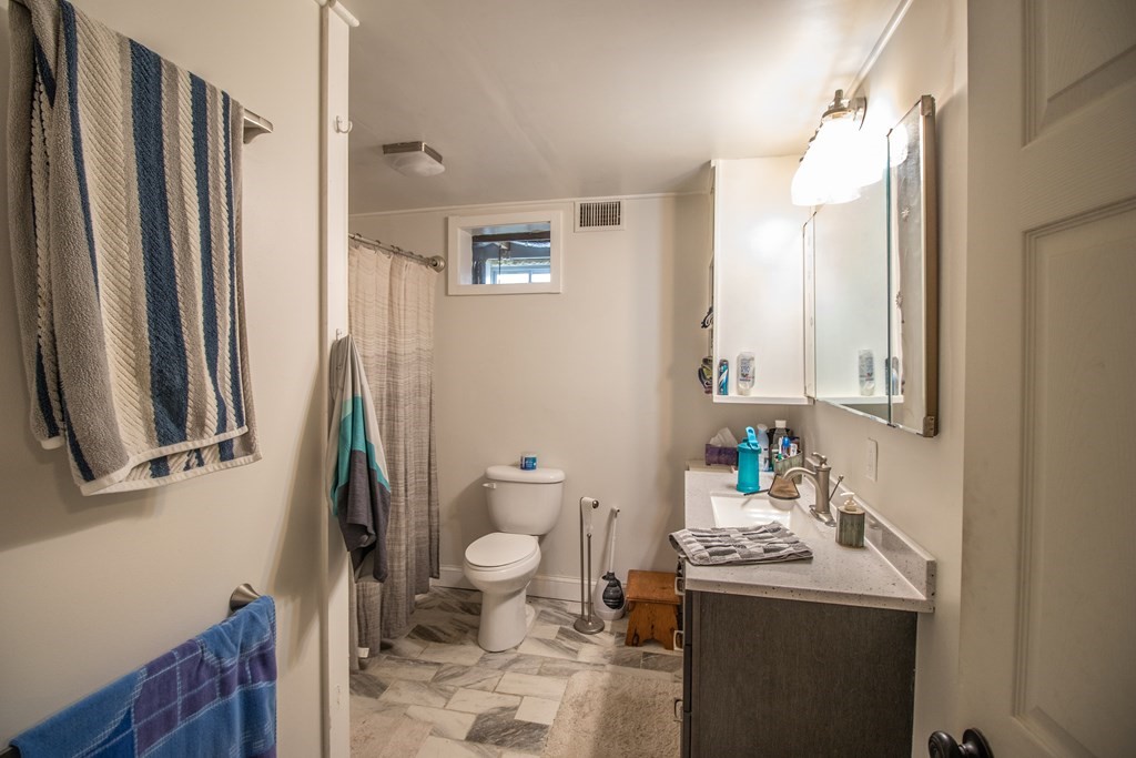 96 Cold Hill Granby, MA 01033 - Photo 37 of 42 a bathroom with a sink toilet and shower