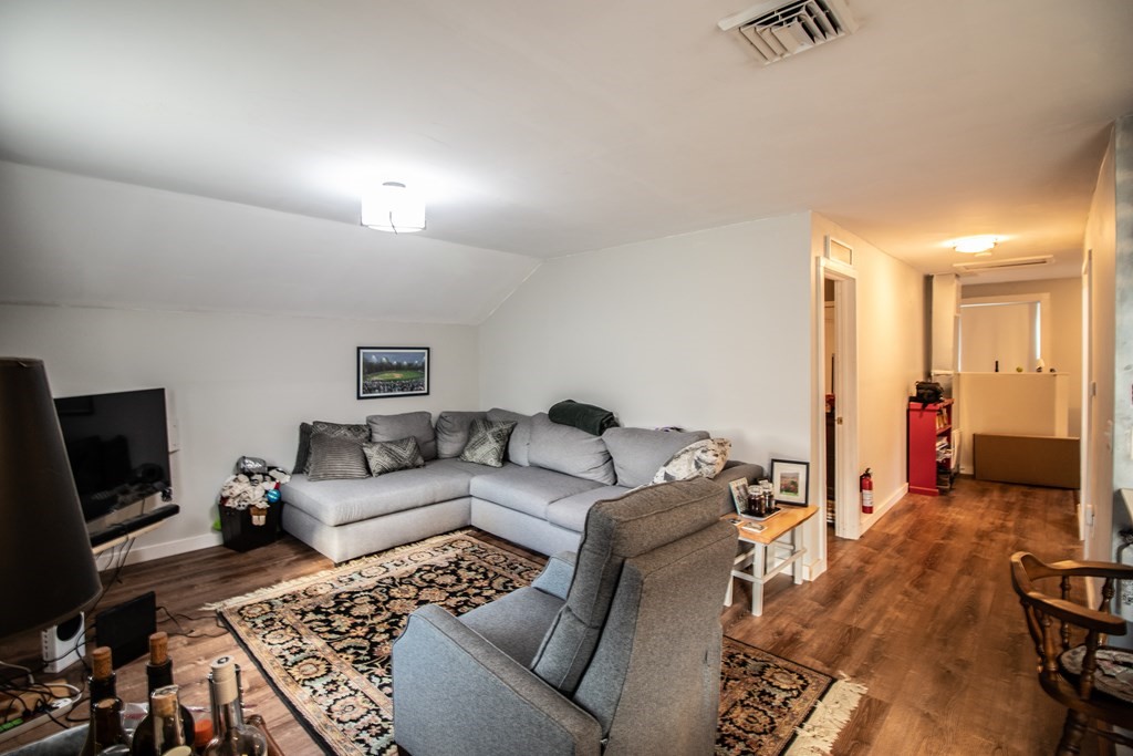 96 Cold Hill Granby, MA 01033 - Photo 40 of 42 a living room with furniture and a flat screen tv